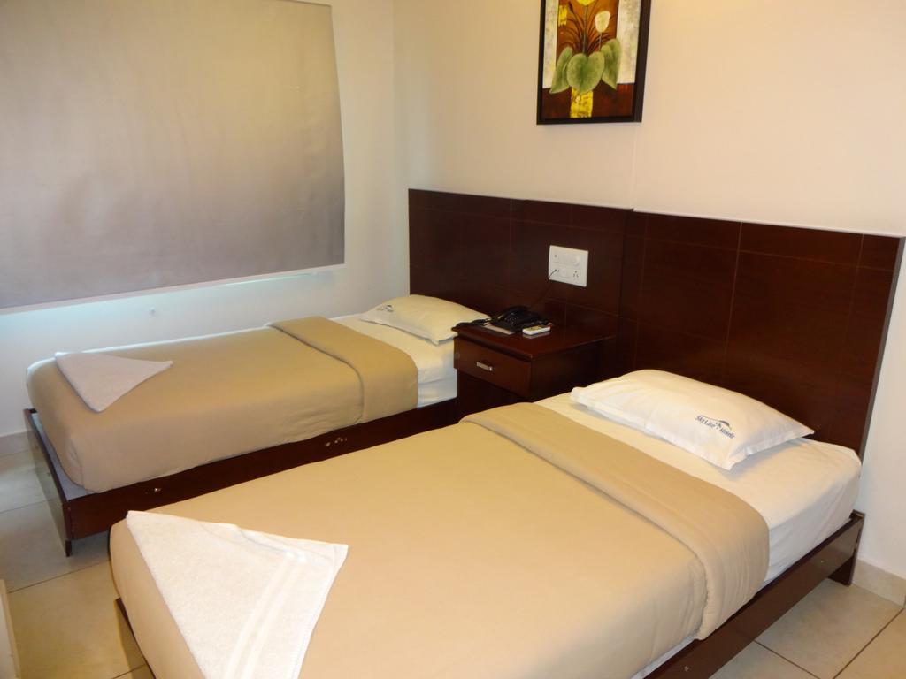 Hotel Sky Lite Coimbatore Habitación foto